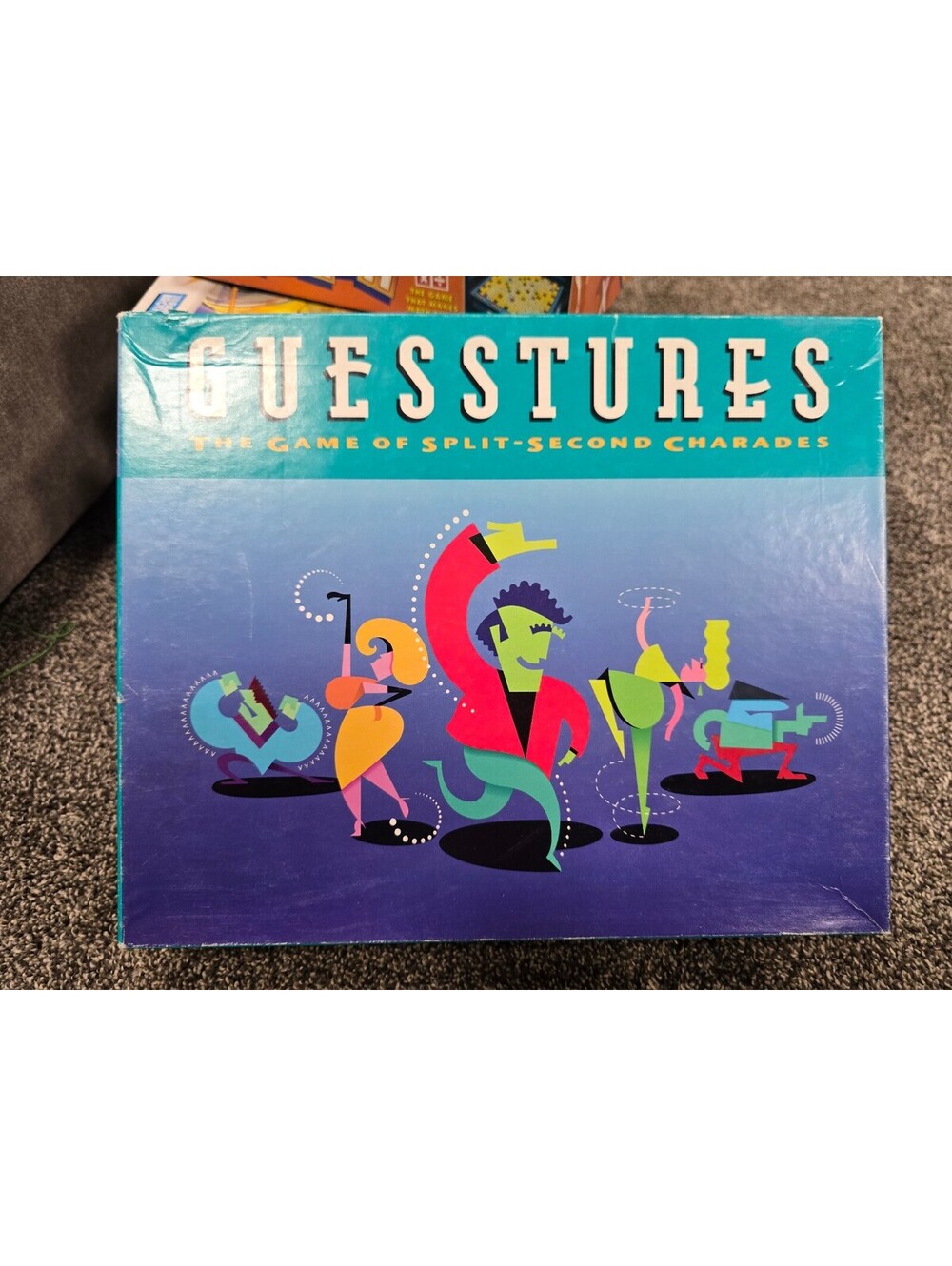Guesstures Board Game - The Game of Split-Second Charades